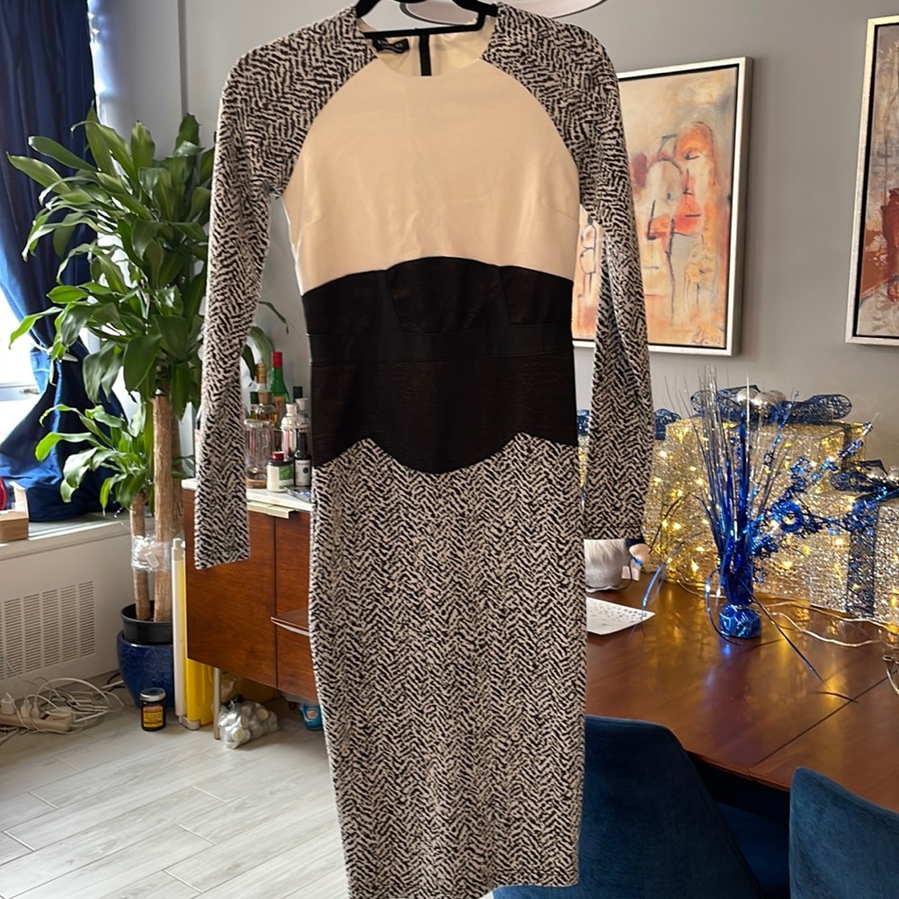 Bebe bodycon dress. Long sleeve. Size S/P.